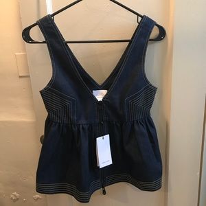 Denim peplum zip top